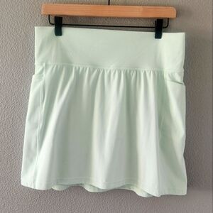Athleta Salutation Stash Skort Large 16.5" Pocket Skirt Shorts Golf Tennis Green